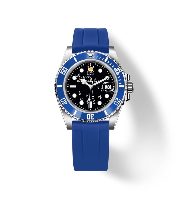 Luxury diving watch with stainless steel case, blue bezel, black dial, and blue rubber strap