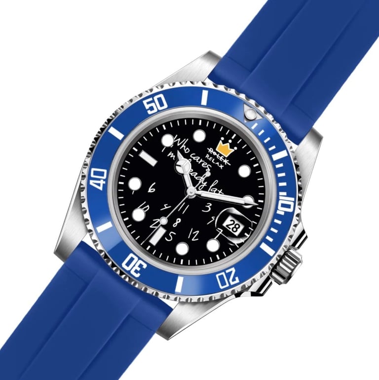 Luxury dive watch with blue rubber strap, silver metal case, blue rotating bezel, and black dial with white hour markers and date window